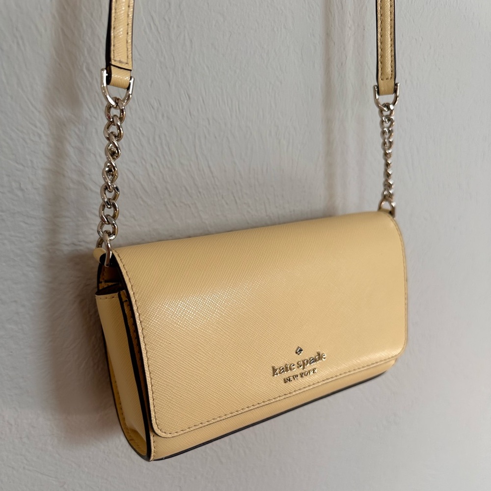 Yellow Kate Spade flap crossbody bag